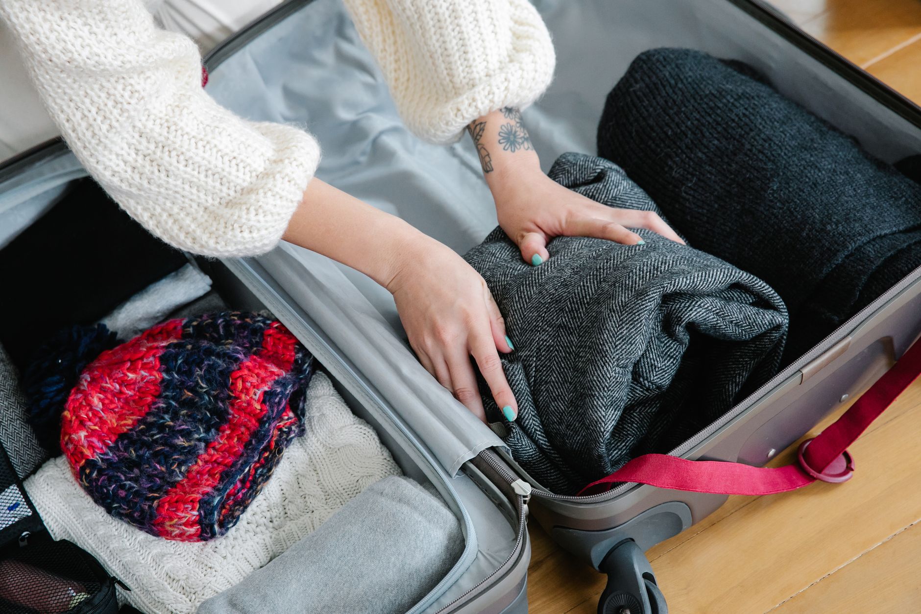Anything to Declare? Four Red Knits, One Carry-On, and My Mother Working the Front Door